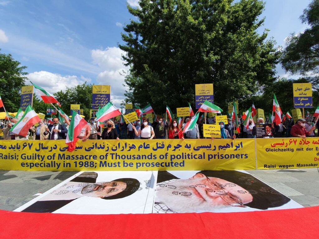 Exil-Iraner in Berlin, fordern strafrechtliche Ermittlungen gegen Raisi